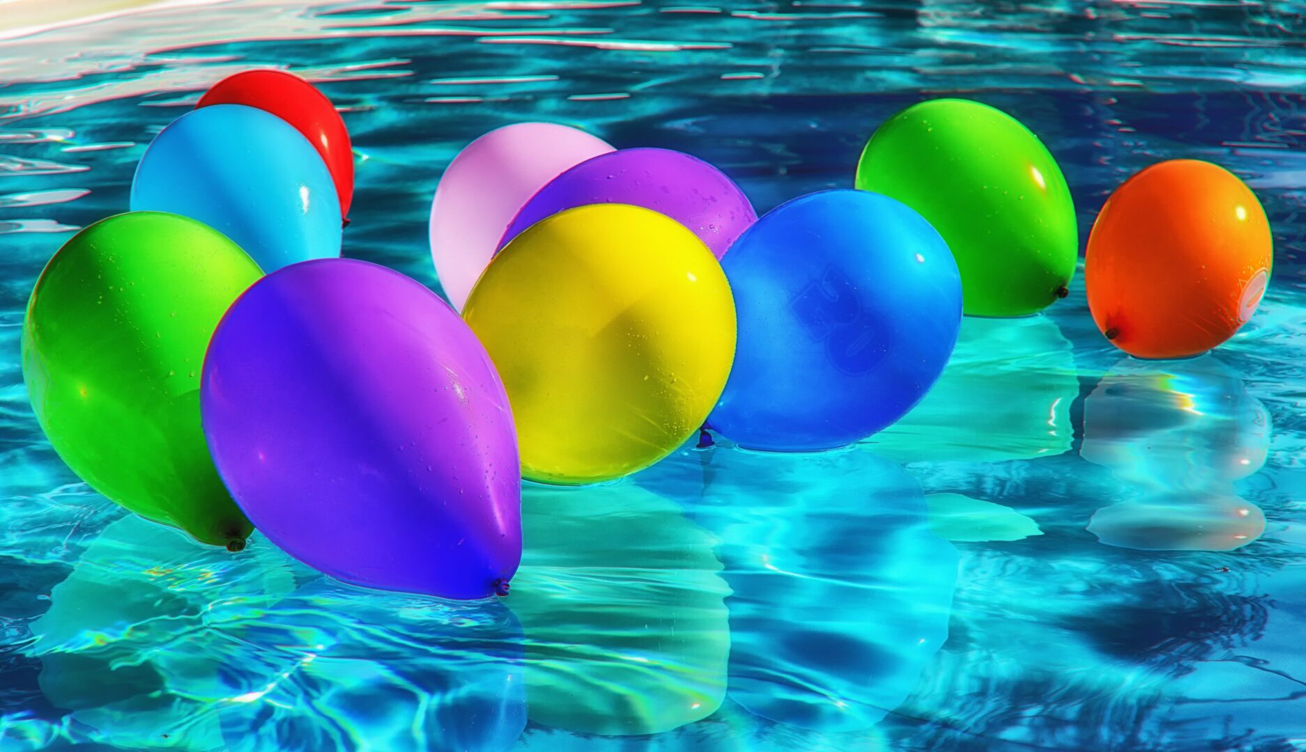 photo of balloons on water