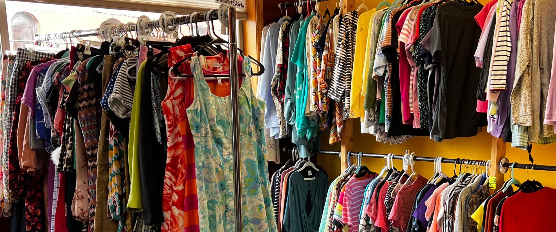 Spring clothing hanging on racks